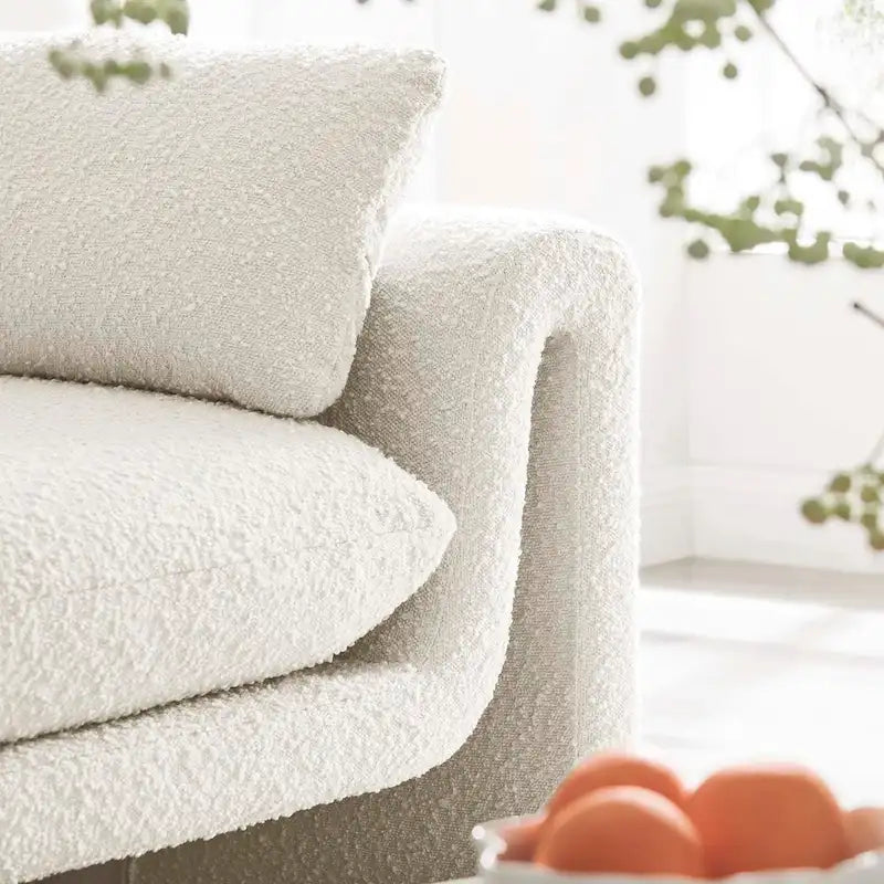 Canapé en tissu bouclé