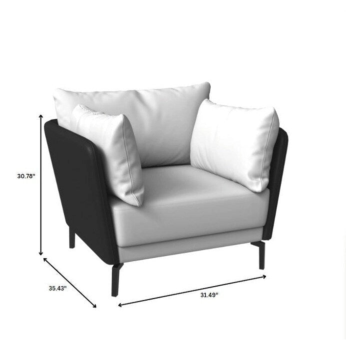 Fauteuil moderne monoplace en similicuir rembourré avec pieds en métal pour salon
