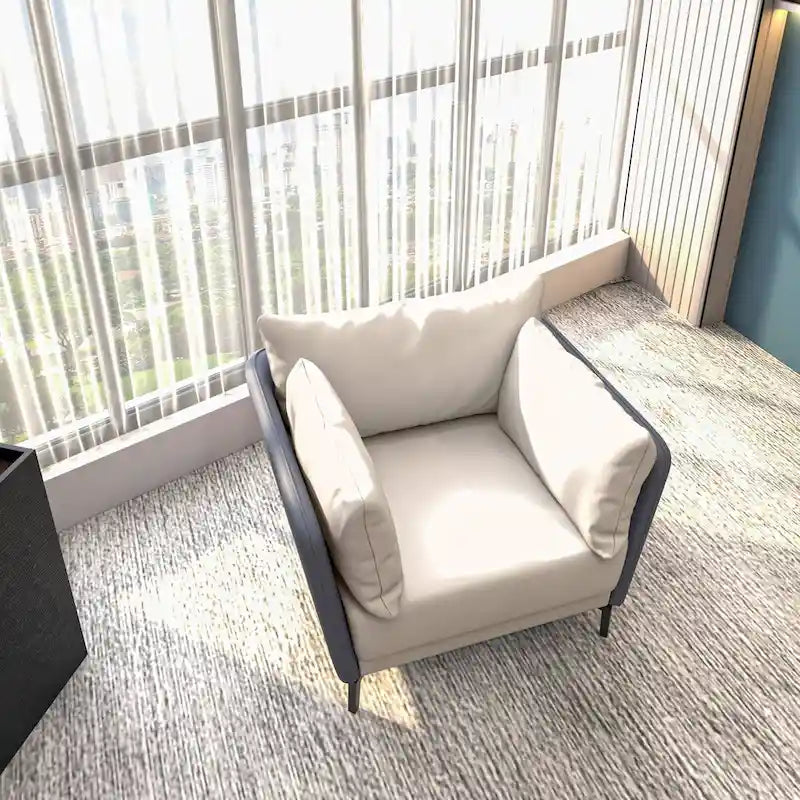 Fauteuil moderne monoplace en similicuir rembourré avec pieds en métal pour salon